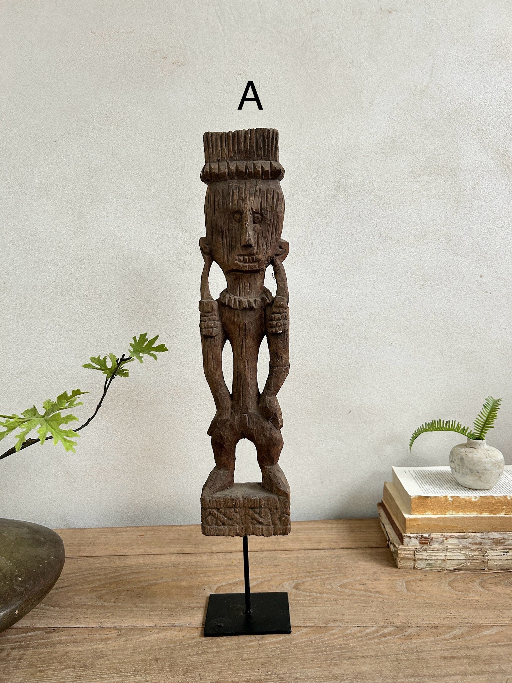 Antique hand-carved wooden statues on stand | Wira