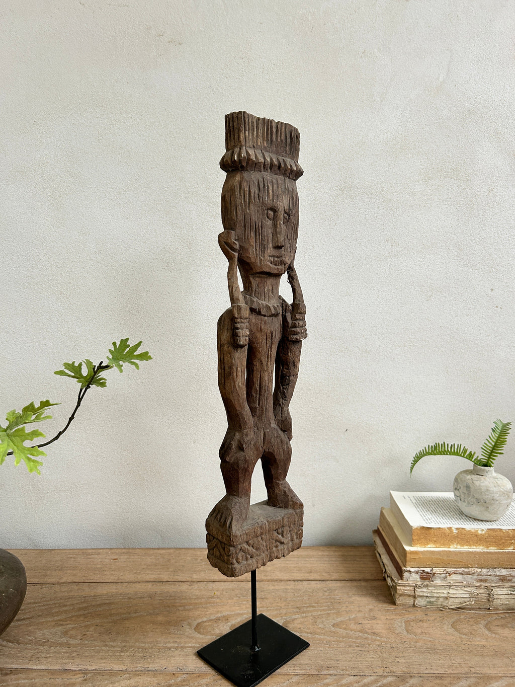 Antique hand-carved wooden statues on stand | Wira