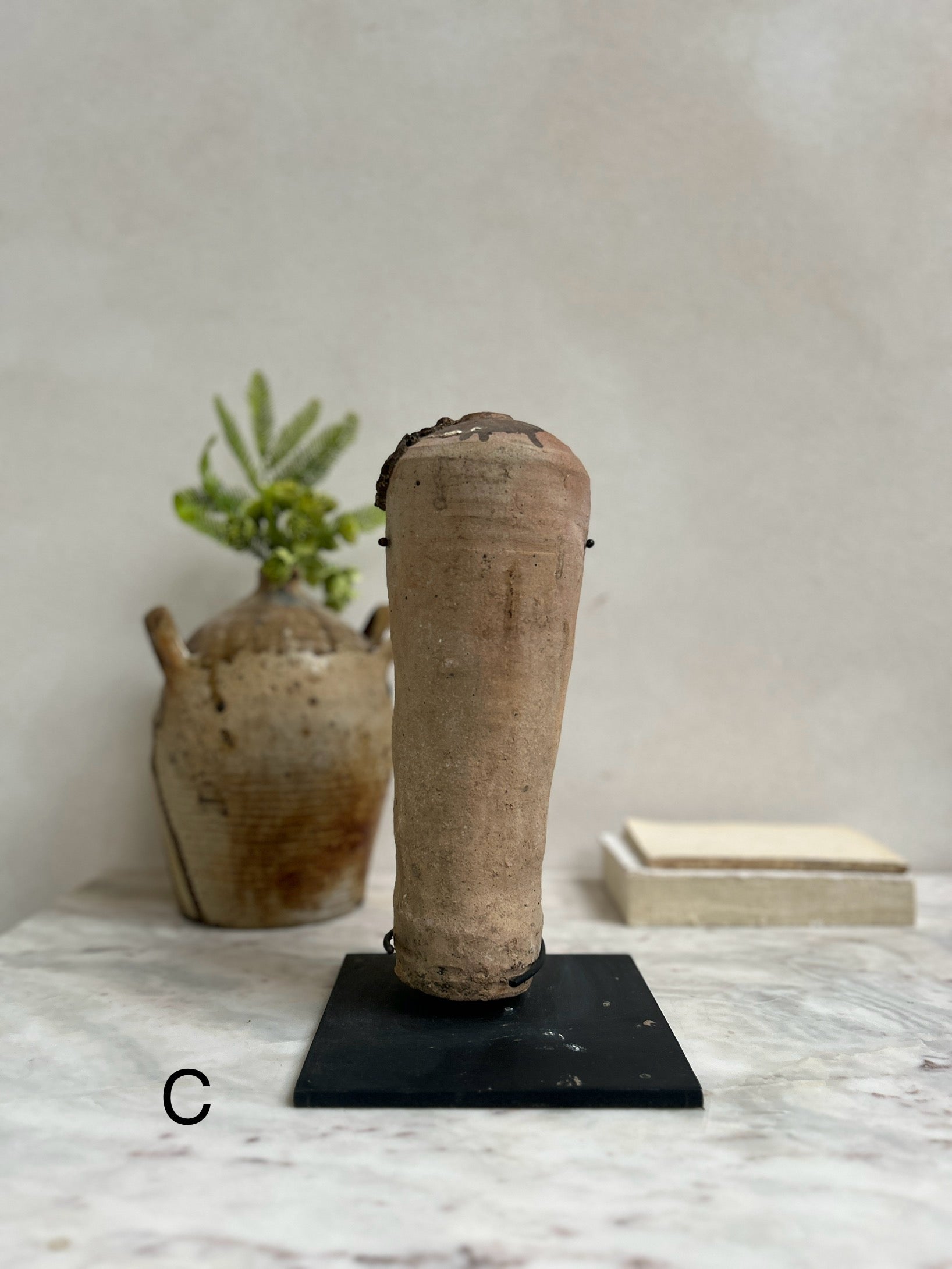 Antique mercury vessel on stand