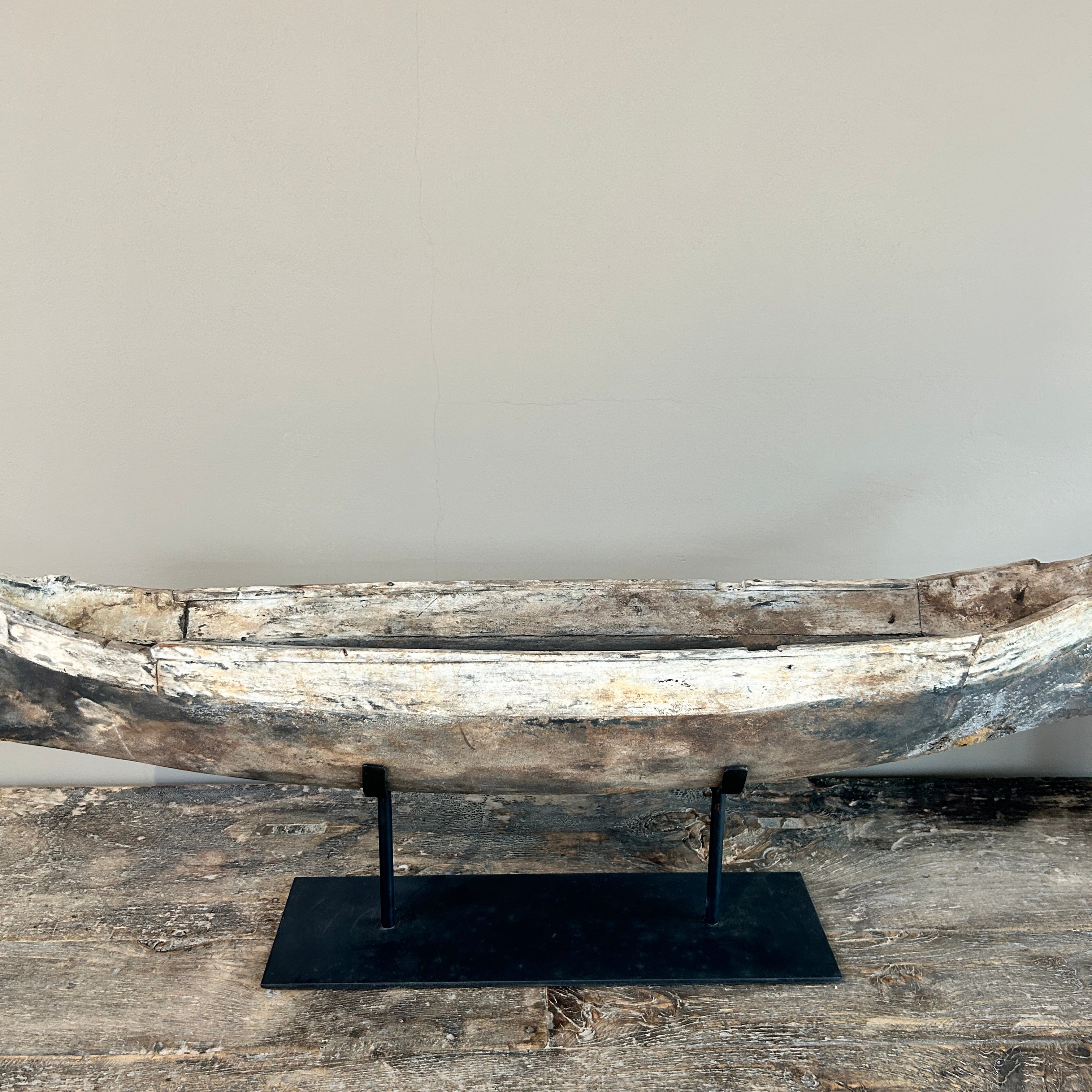 Antique wooden boat on stand | Krishna