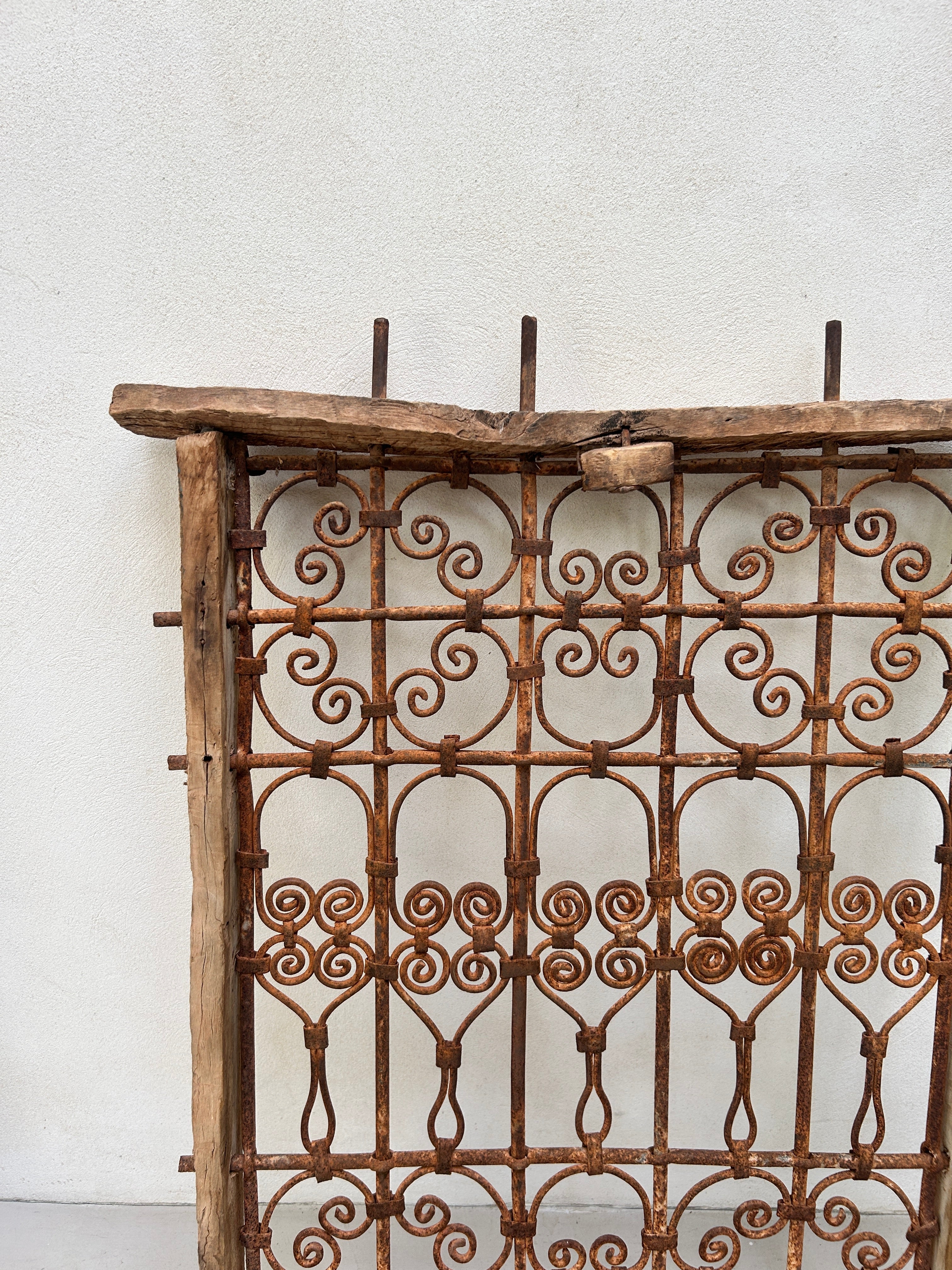 Cast iron antique wooden window grille | Agus