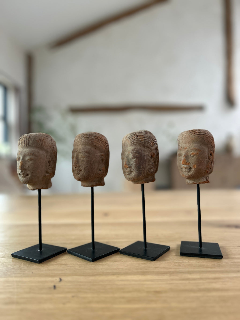 Hand-made antique terracotta heads on stand | Sita