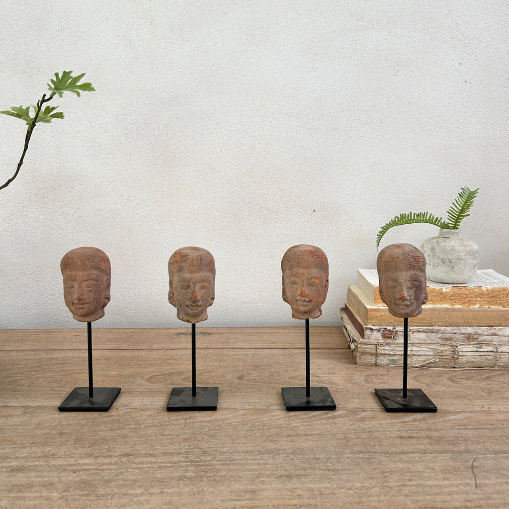 Hand-made antique terracotta heads on stand | Sita