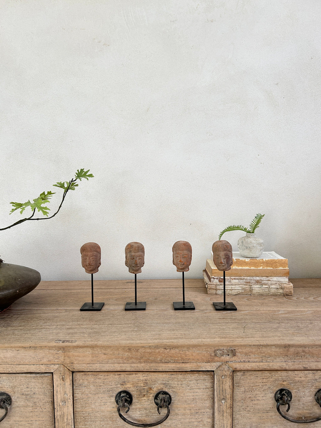 Hand-made antique terracotta heads on stand | Sita