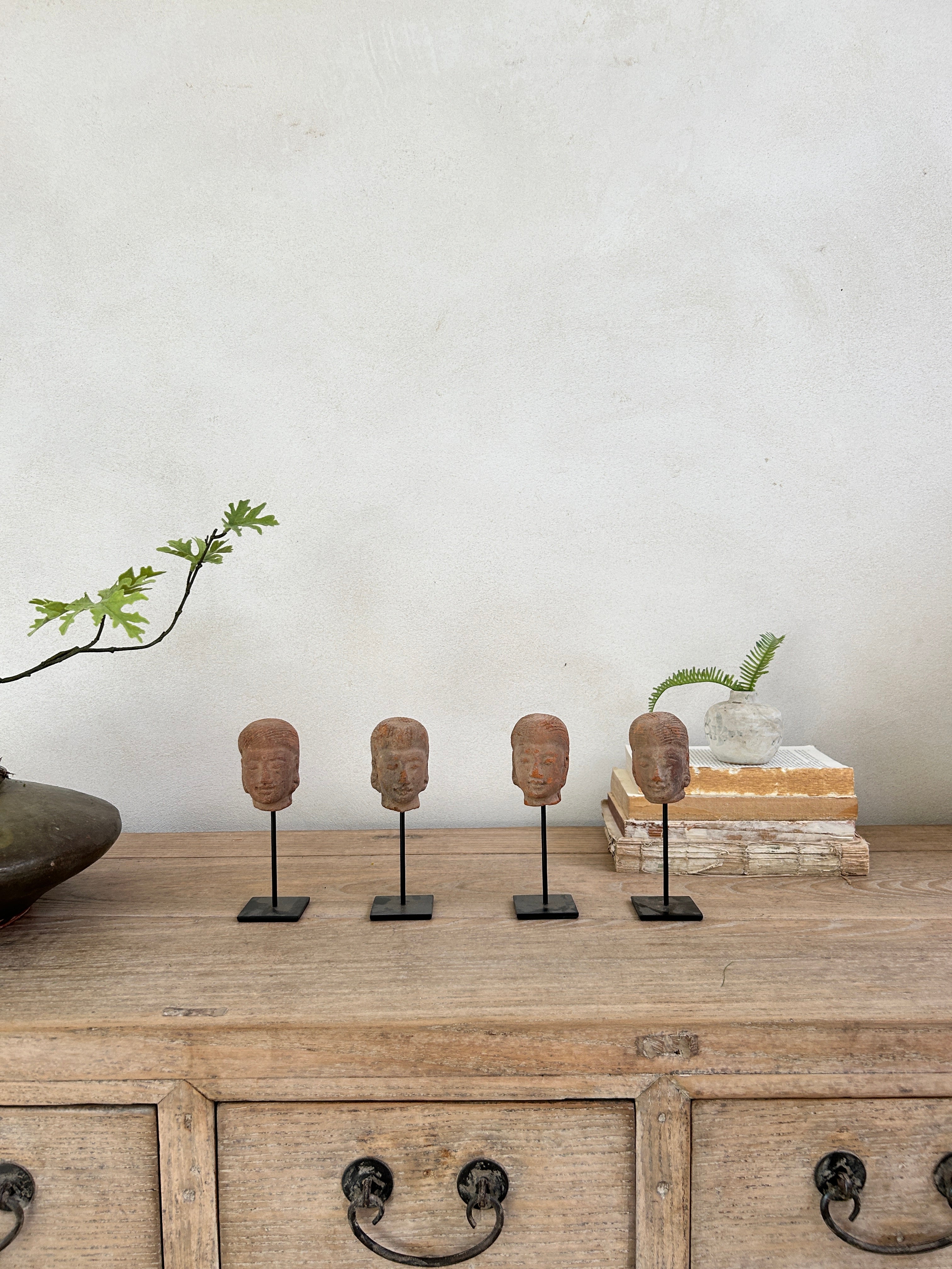 Hand-made antique terracotta heads on stand | Sita
